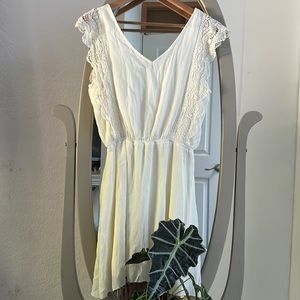 Cream lace trim dress.